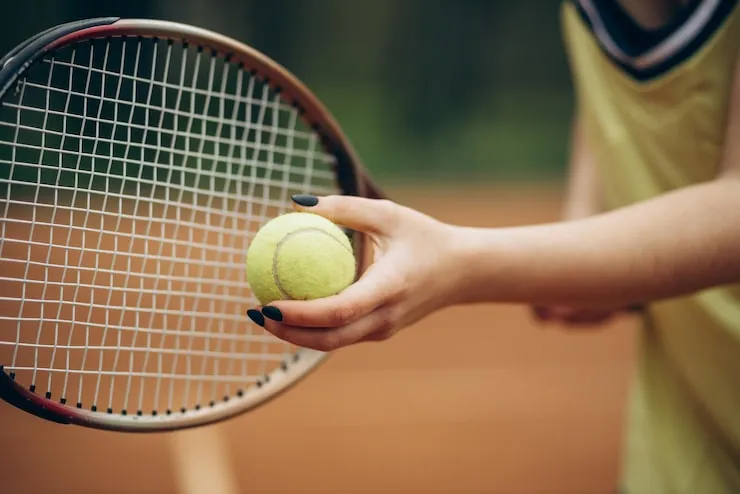 Why Do Tennis Players Bounce the Ball Before Serving?